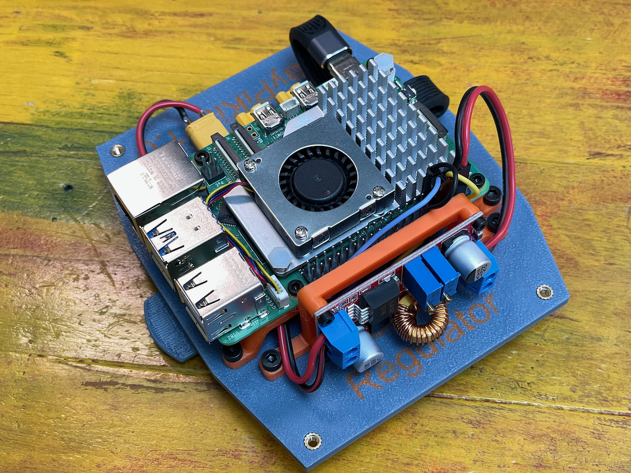 Voltage Regulator Plugged to Pi